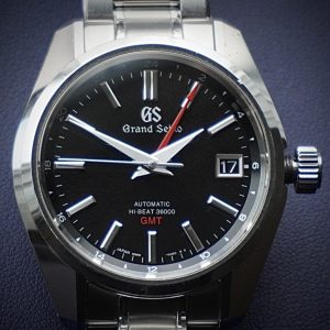 Grand Seiko SBGJ203 (9S86‑00A0) — Hi-Beat GMT Mastery in Steel